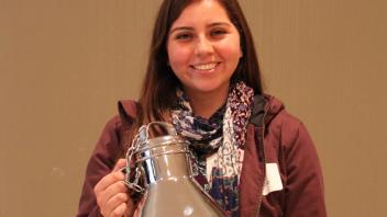 Maria Patino with the “Cream of the Crop” trophy from Hilmar