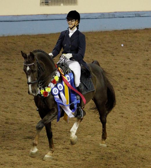 Photo of Josie Trott on horseback
